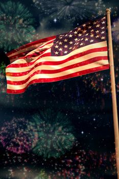 USA national flag against colourful fireworks exploding on black background