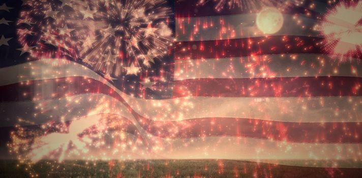 Digitally generated united states national flag against colourful fireworks exploding on black background