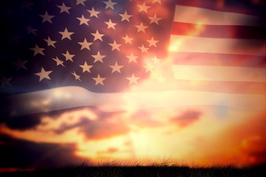 United states of america flag against blue and orange sky with clouds