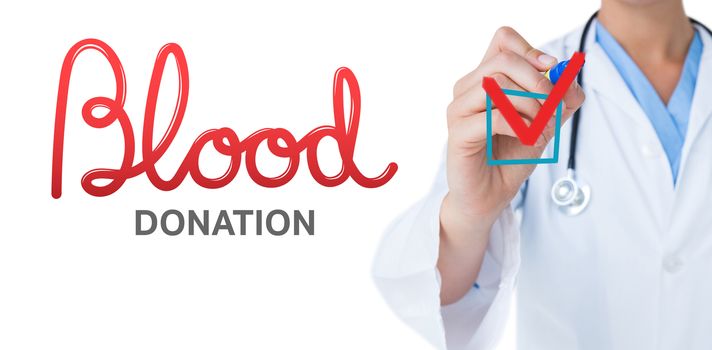 Doctor pointing felt pen against blood donation