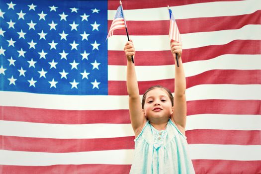 Cute girl with american flag against rippled us flag