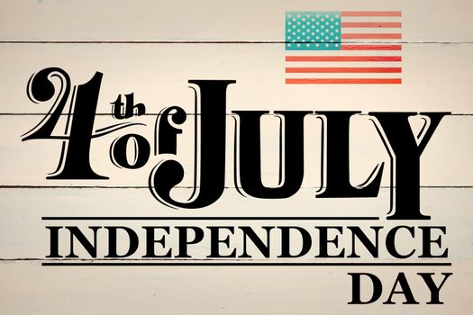 Independence day graphic against painted blue wooden planks