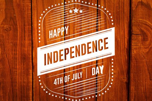 Independence day graphic against overhead of wooden planks