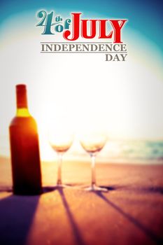 Independence day graphic against bottle of wine with two glass