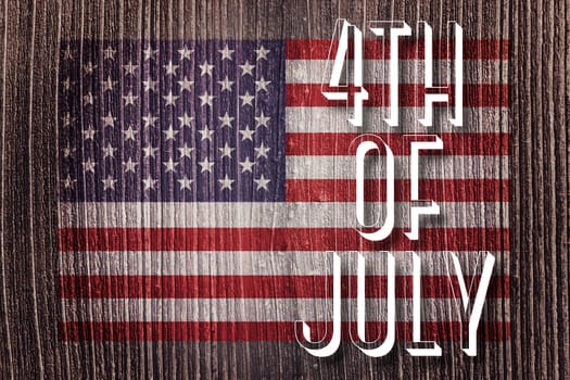 Independence day graphic against wooden planks