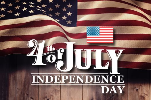 Independence day graphic against wooden planks