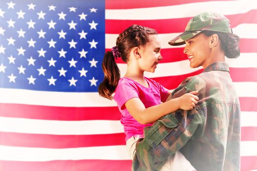 Solider reunited with daughter against rippled us flag