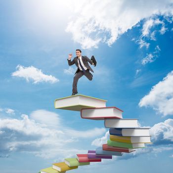 Cheerful businessman in a hurry against blue sky