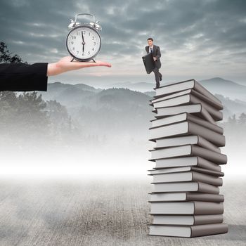 Smiling businessman in a hurry against misty forest