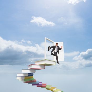 Stern businessman in a hurry against blue sky