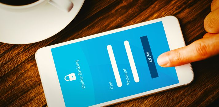 Online banking against smartphone on desk