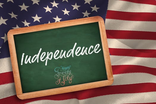 Independence day graphic against blackboard with copy space