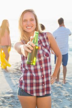 group of friends having fun at the beach