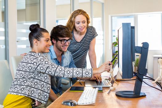 Professional designers working on computer in the office