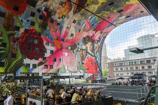 Rotterdam, Netherlands - May 9, 2015: Retail Shop in Markthal (Market hall) a new icon in Rotterdam. The covered food market and housing development shaped like a giant arch by Dutch architects MVRDV.