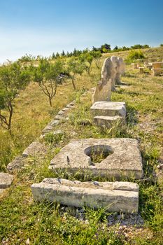 Stone artifacts of ancient town of Asseria in Croatia