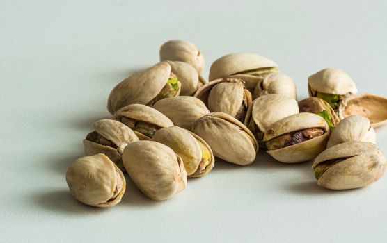 a group of pistachios in their shell