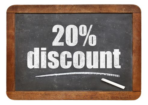 twenty percent discount sign - white chalk text on an isolated  vintage slate blackboard