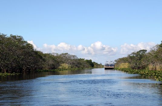 Airboat on quiet lake in Everglades National Park