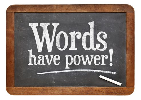 Words have power sign - white chalk text  on a vintage slate blackboard