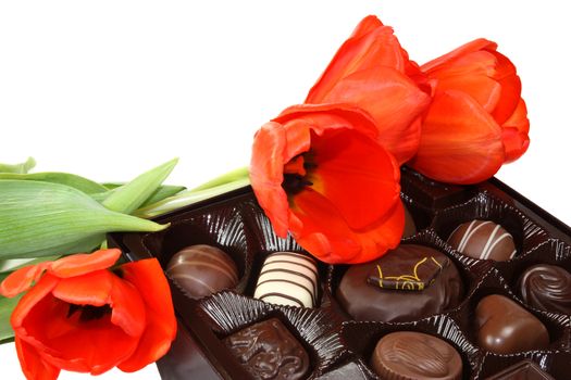 Red tulips and box of chocolate candy