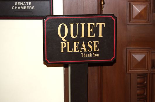 Quiet Please sign near the door