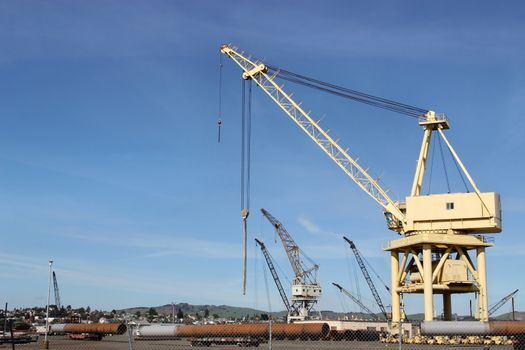 High crane on abandoned construction site