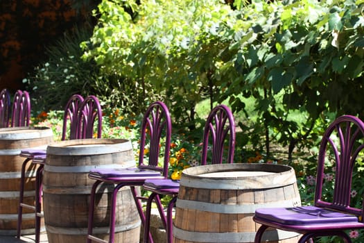 Outdoor wine tasting setting on old barrels