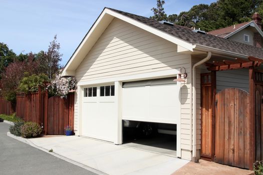 Open garage door in suburban house