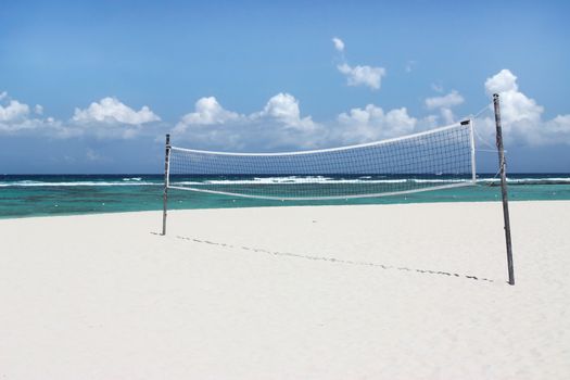 Volleyball net on beautiful tropical beach