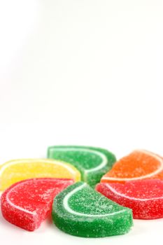 Colorful assorted candy on white background