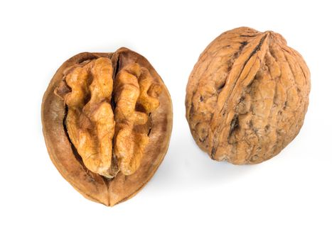 Opened and whole walnuts