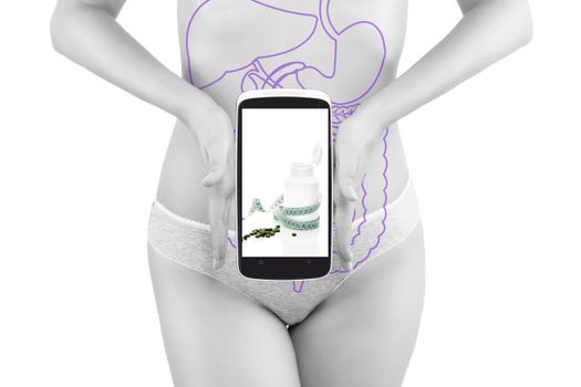 Detox app on smartphone and beautiful female body and belly. Detox and healthy living in the information age.