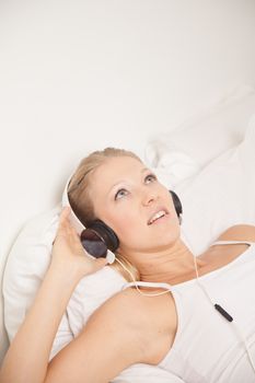 Pretty woman listening to music