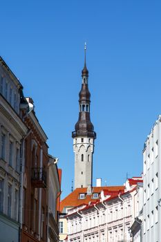 Front view of medieval Lutheran Church of the Holy Ghost in Tallinn, Estonia, on blue clear sky background.