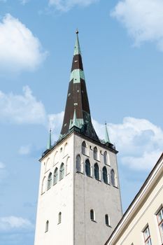 Outside view of St. Olaf Church, on blue cloudy sky background.