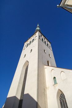 Outside bottom view of St. Olaf Church, on navy blue sky background.