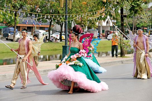 CHIANGMAI, THAILAND - FEBRUARY 2-2013 : Unidentified Thai people on the parade in ChiangMai Flower Festival 2013 at ChiangMai, Thailand.