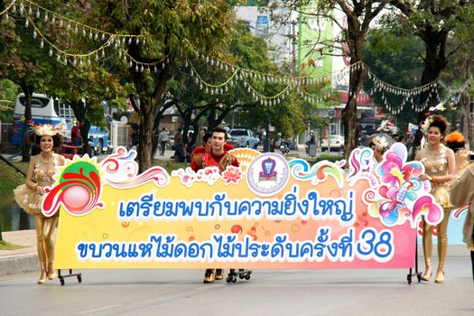 CHIANGMAI, THAILAND - FEBRUARY 2-2013 : Unidentified Thai people on the parade in ChiangMai Flower Festival 2013 at ChiangMai, Thailand.