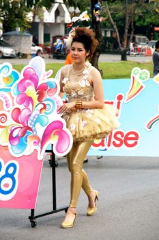 CHIANGMAI, THAILAND - FEBRUARY 2-2013 : Unidentified Thai people on the parade in ChiangMai Flower Festival 2013 at ChiangMai, Thailand.