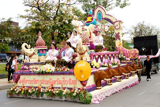 CHIANGMAI, THAILAND - FEBRUARY 2-2013 : Unidentified Thai people on the parade in ChiangMai Flower Festival 2013 at ChiangMai, Thailand.