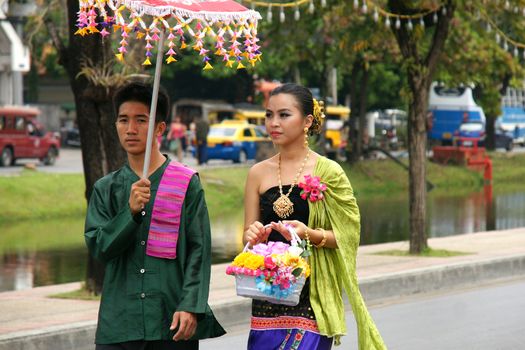 CHIANGMAI, THAILAND - FEBRUARY 2-2013 : Unidentified Thai people on the parade in ChiangMai Flower Festival 2013 at ChiangMai, Thailand.