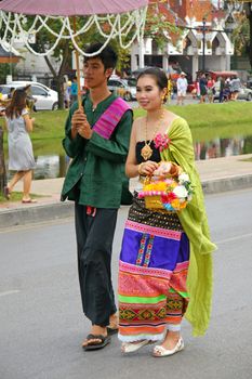 CHIANGMAI, THAILAND - FEBRUARY 2-2013 : Unidentified Thai people on the parade in ChiangMai Flower Festival 2013 at ChiangMai, Thailand.