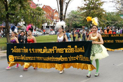 CHIANGMAI, THAILAND - FEBRUARY 2-2013 : Unidentified Thai people on the parade in ChiangMai Flower Festival 2013 at ChiangMai, Thailand.