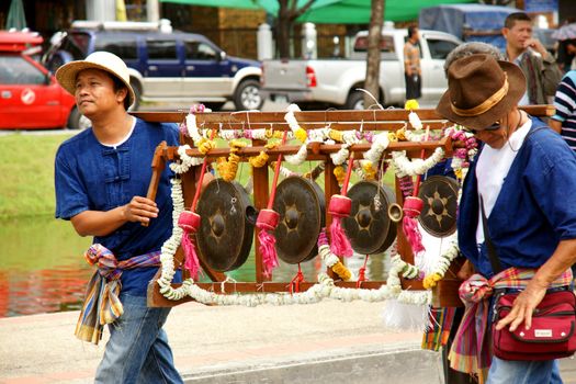 CHIANGMAI, THAILAND - FEBRUARY 2-2013 : Unidentified Thai people on the parade in ChiangMai Flower Festival 2013 at ChiangMai, Thailand.