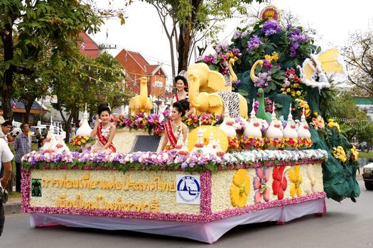 CHIANGMAI, THAILAND - FEBRUARY 2-2013 : Unidentified Thai people on the parade in ChiangMai Flower Festival 2013 at ChiangMai, Thailand.