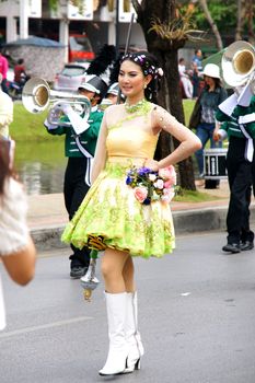 CHIANGMAI, THAILAND - FEBRUARY 2-2013 : Unidentified Thai people on the parade in ChiangMai Flower Festival 2013 at ChiangMai, Thailand.