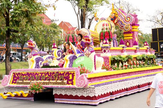 CHIANGMAI, THAILAND - FEBRUARY 2-2013 : Unidentified Thai people on the parade in ChiangMai Flower Festival 2013 at ChiangMai, Thailand.