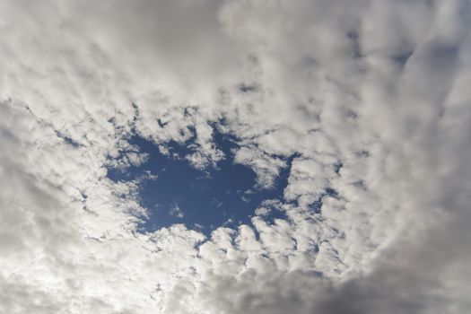 Abstract shot of the sky - hole in the clouds