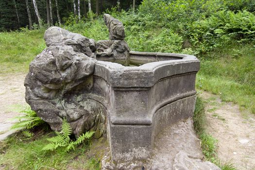 The Bethlehem of Braun or Kusk Forest Sculptures is a complex of Baroque statues and relieves carved by famous sculptor Matthias Bernard Braun directly in sandstone rocks in the forest near complex Kuks Hospital in Northern Bohemia, Czech Republic. Part of the sculptures in the New Forest is ranked the best works of Czech Baroque sculpture. Since 2002, the area is protected as a National Historic Landmark and were listed in the 2000 World Monuments Watch by the World Monuments Fund.